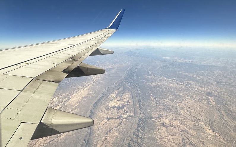 Aerial view of aircraft above land