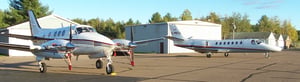Merrill Municipal Airport airplanes and hangar