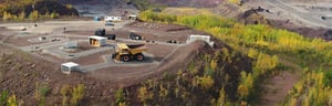 Construction vehicles in open-pit mine