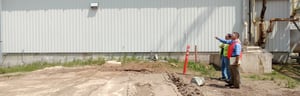 Engineers looking over construction at agricultural plant