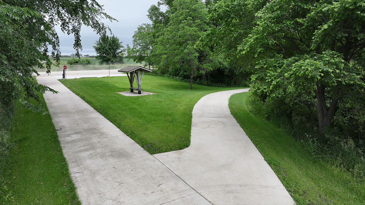 An image of Prairie Springs Trail splitting into two separate paths.
