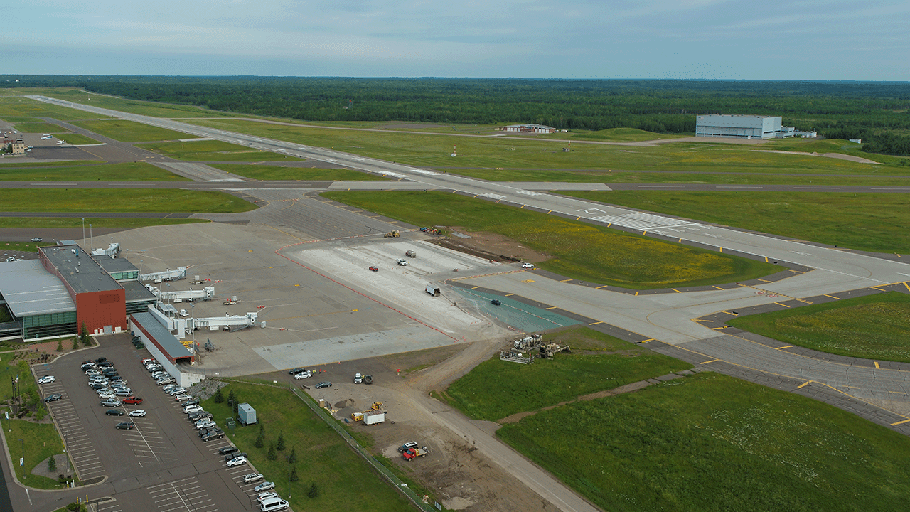 Initial pavement removal and excavation near the terminal apron.