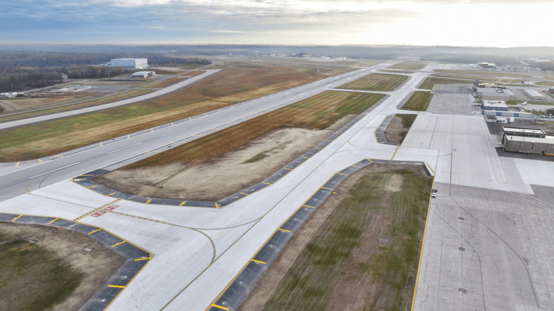 Final construction activities and paving operations completing the Taxiway A reconstruction project.