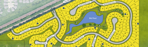 Color-coded site plan of a residential subdivision with numbered lots, roads, and a central pond.