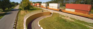 Cycling path going under train track via tunnel