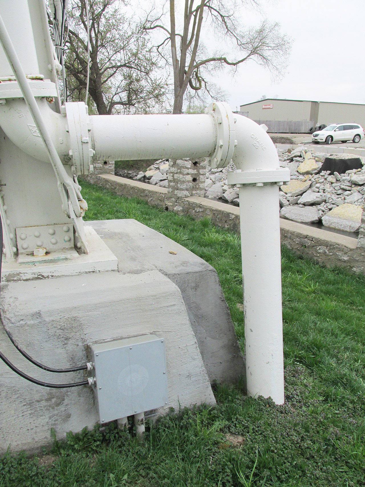 overflow pipe that terminates into the ground