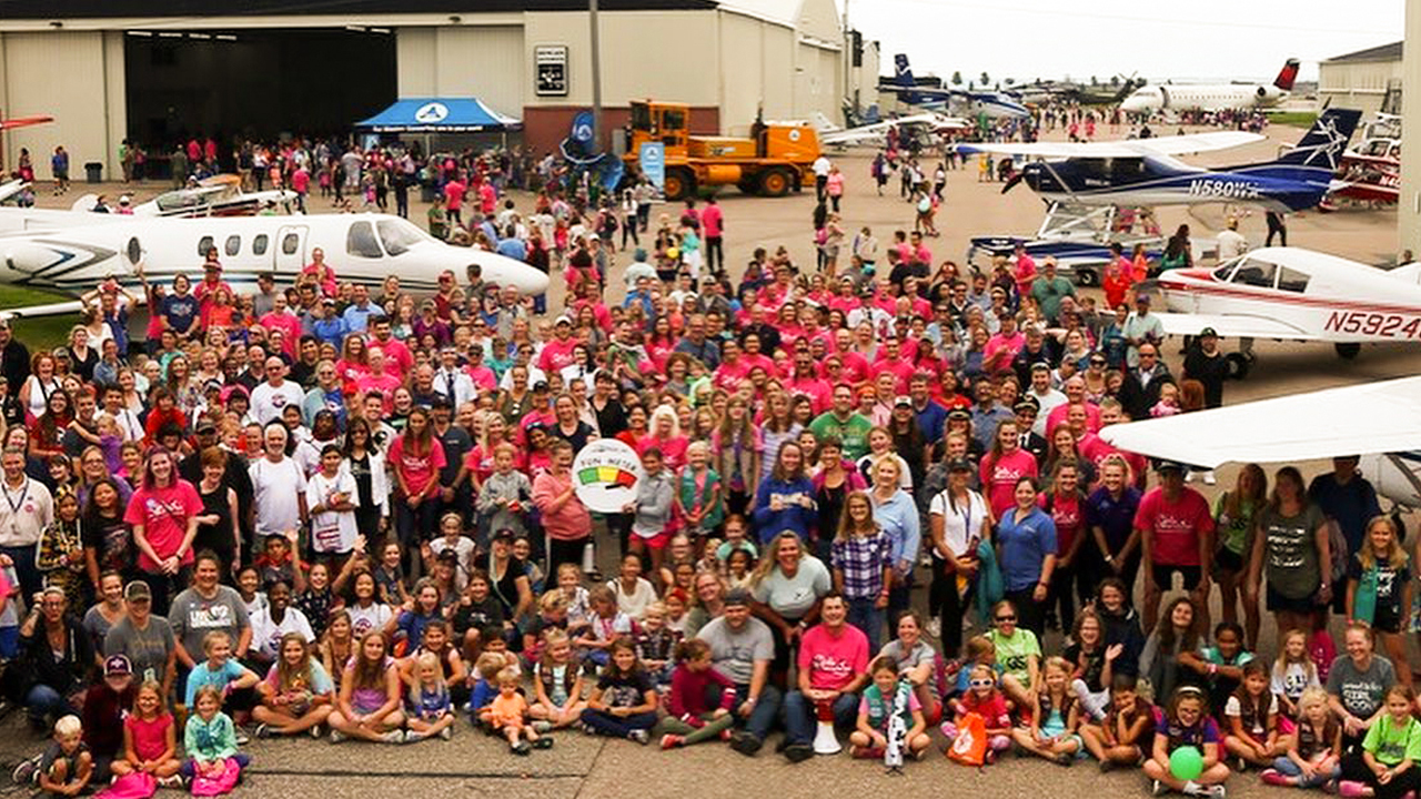 Group photo at aviation event